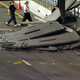 Firefighters inspect a section of ceiling in the Interstate 90 eastbound connector tunnel through Boston in this file photo taken July 11, 2006, that collapsed onto the roadway and killed a woman passenger in a car, in this Sunday, July 10, 2006. The fatal collapse raised questions about a project that has long been under scrutiny _ and exposed a confluence of events that led to the collapse. (AP Photo/Michael Dwyer